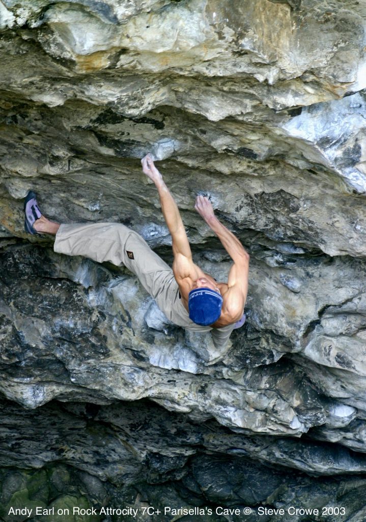 Andy Earl climbing Rock Attrocity Font 7C+ Parisellas Cave © Steve Crowe 2003