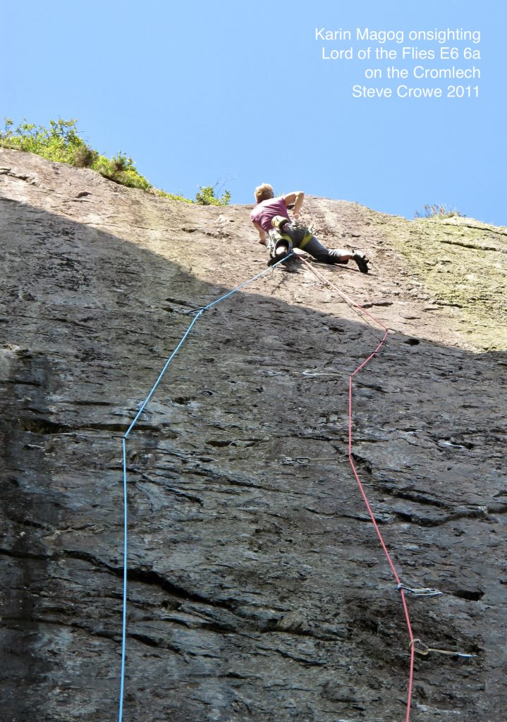 Karin Magog onsighting Lord of the Flies E6 6a on the Cromlech © Steve Crowe 2011